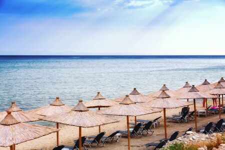 Sandy beach with sea horizon in background.の写真素材
