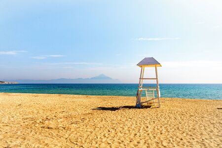 Mediterranean beach watch tower on a bright sunny day.の写真素材