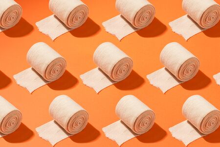 Medical bandage pattern, isolated against colorful background.の写真素材
