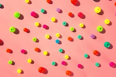 Colorful plastic balls for kids, lay flat on top of purple background.の写真素材