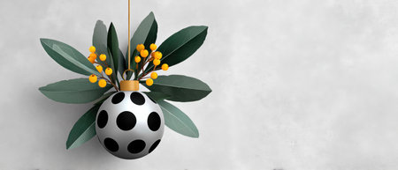 Collage modern ornament with polka dot bauble and green leaves with yellow berries creating festive minimalist still life collageの素材