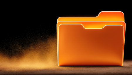 Glowing orange folder data security concept with dust particles and dark backgroundの素材