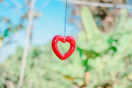 red heart on nature background.の写真素材