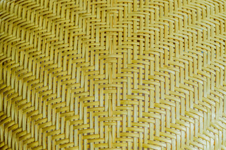 Yellow bamboo wood popular weave. Thai bamboo weave pattern.の写真素材