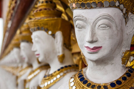 The row of  thai art sculpture in the templeの写真素材