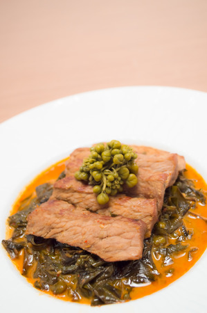cassioa leaf and flower curry with roasted meatの写真素材