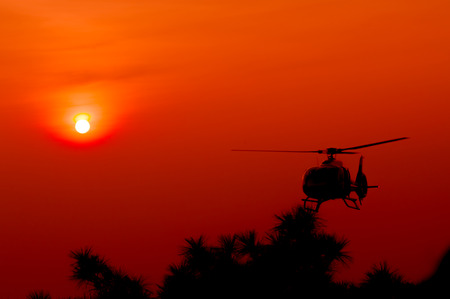The patrol helicopter flying in the sky