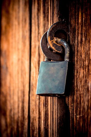 The master key at the old wood doorの写真素材