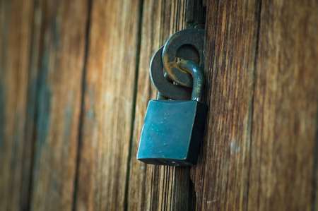 The master key at the old wood doorの写真素材