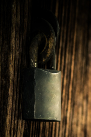 The master key at the old wood doorの写真素材