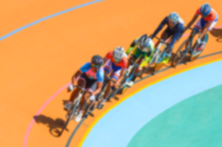 Bike race on velodrome track blurry for background