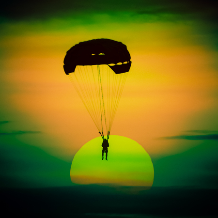 parasailing parachute on sunset at Pattaya beach Thailandの写真素材