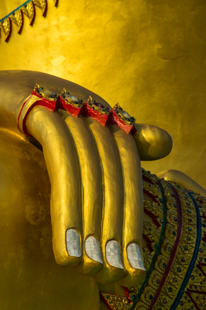 Golden image of buddha hand thai styleの写真素材