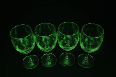 abstract green lighting glass with black background の写真素材