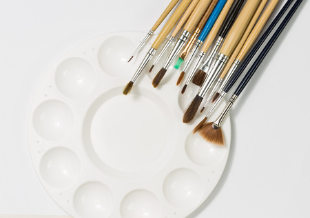 art palette with brushesの写真素材