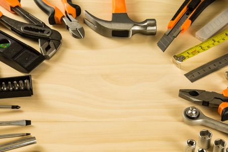 Set of working tools on wooden tableの写真素材