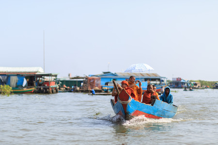 TONLE SAP LAKE SIEM REAP, CAMBODIA - JANUARY 10: unidentified tourists travel on Tourist boats on January 10, 2012 at Tonle Sap Lake, Siem Reap Cambodiaのeditorial素材