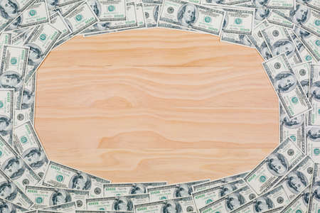 Dollars money on a wooden backgroundの写真素材