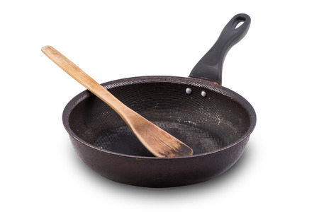 used Non stick frying pan isolated on whiteの写真素材