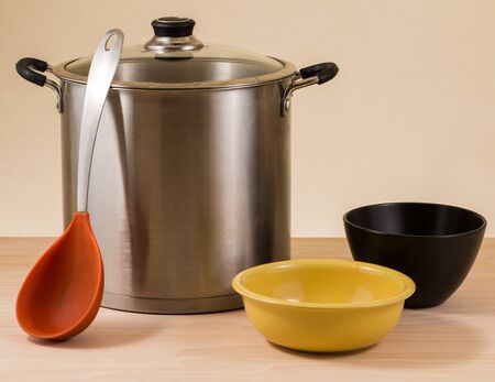 stock pot on wooden tableの写真素材