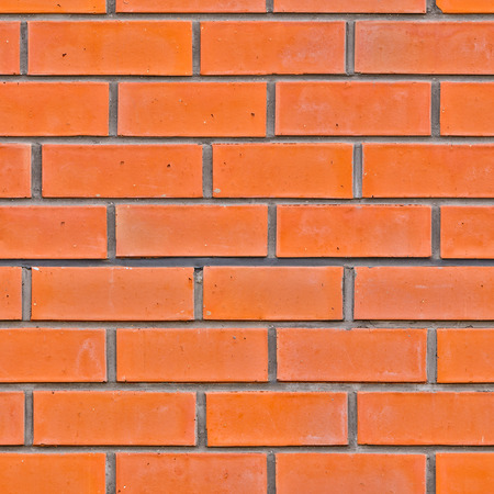 Red brick wall seamless background - texture pattern for continuous replicate.
