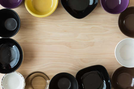 set of bowls on wooden backgroundの写真素材