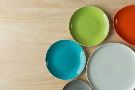 set of dishes on wooden backgroundの写真素材