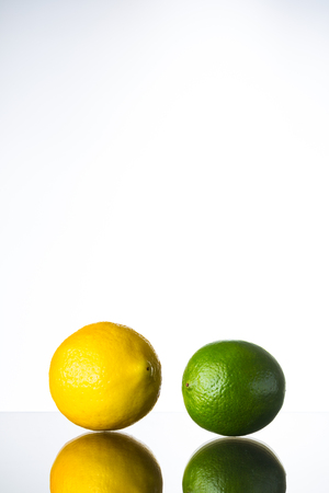 lime and lemon on glass table