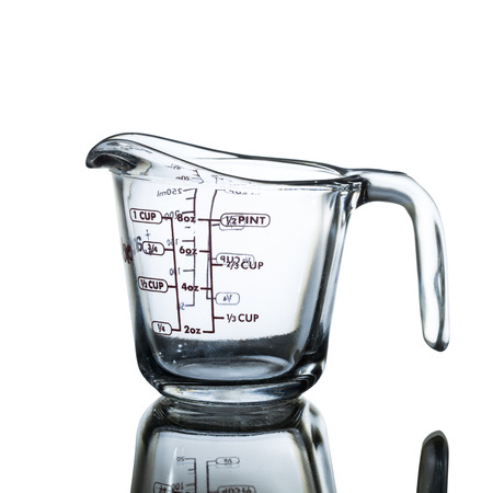 measuring cup isolated on white backgroundの写真素材