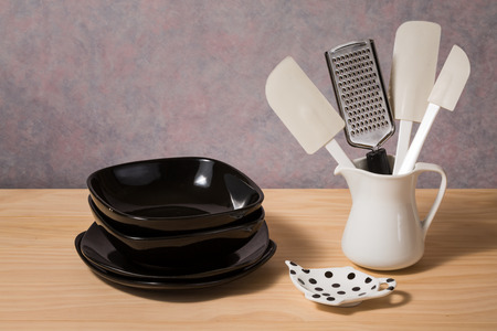 kitchen utensils on wooden table
