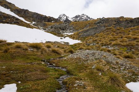 stream and mountain landscape on Lake Alta Track in Queenstown, New Zealand