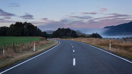 curve road in the early morning in New Zealandの写真素材