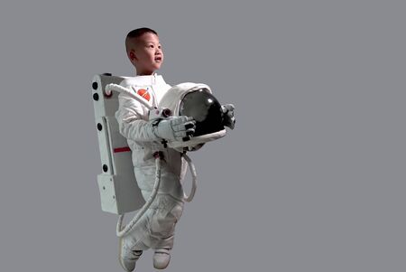 Little boy in space suit.  Kid in space suit.The kids' dream jobs.Cute little boy in space suit...