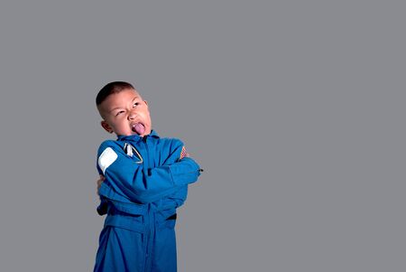 Little boy astronaut in space suit. Boy in blue astronaut suit.The kids' dream jobs.