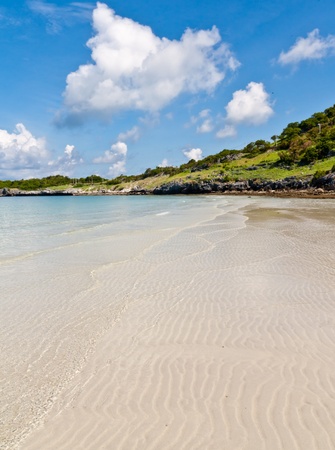 The stretch of beach and blue skyの写真素材