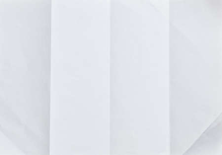 The fold the paper on red backgroundの写真素材