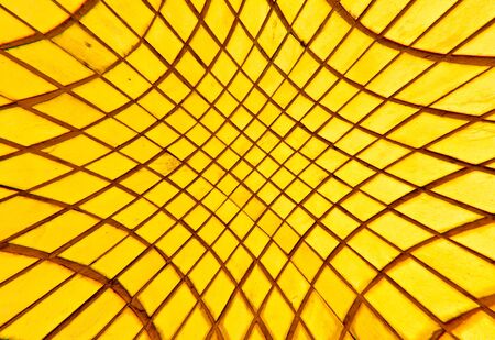 Golden tiles background texture blast out from centerの写真素材