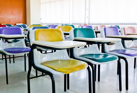 Multi-colored chairs arranged in the room