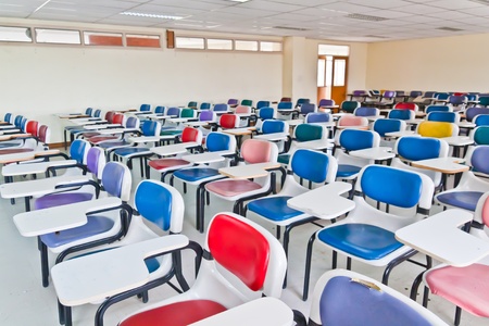 Multi colored chairs arranged in the roomのeditorial素材