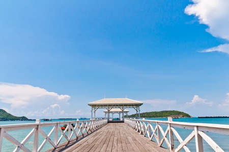 The white bridge stretching to the sea