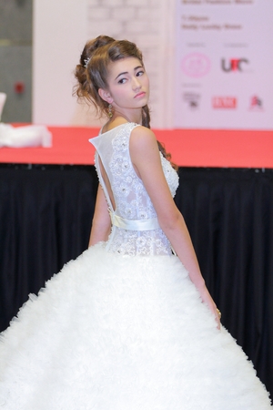 Wedding Village December 6 8th Dec  2013 is Singapores Largest Thematic Wedding Exhibition in Singapore   Exclusive Bridal Show with models strutting down the runway, donning beautiful Wedding and Evening Gowns provided by The Gown Warehouse  There is alのeditorial素材
