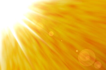 yellow background with sun burst and lens flare. の写真素材