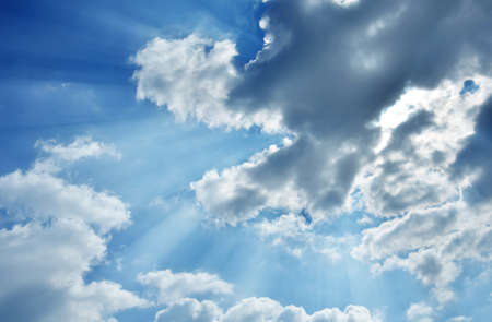 Blue sky with clouds and sun light.