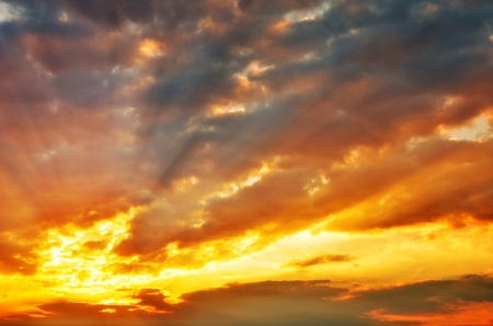 Sunset / sunrise with clouds, light and rays. 