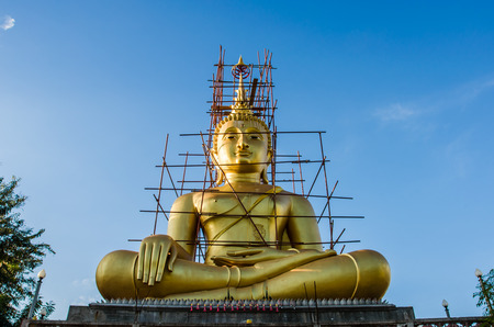 Buddha statue under construction at the temple of Thailand.の写真素材