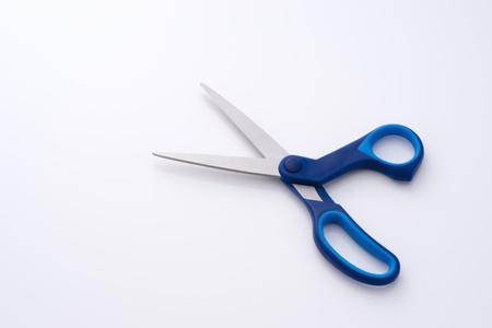 blue scissors on the white backgroundの写真素材