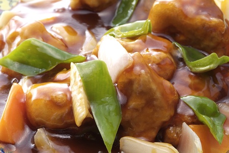 Chinese food is cooked with pork and vegetablesの写真素材