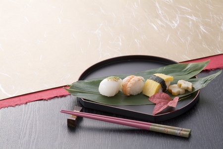 various sushi ball and chopsticks の写真素材