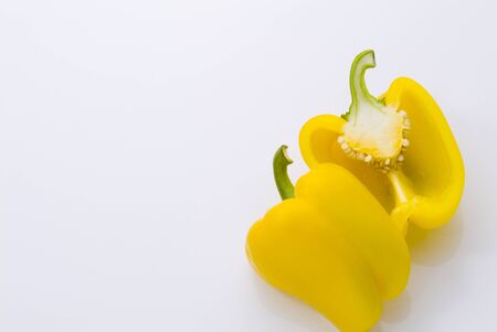 a background image of yellow paprika on whiteの写真素材