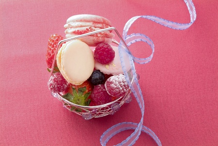macaroon and berrys in basketの写真素材